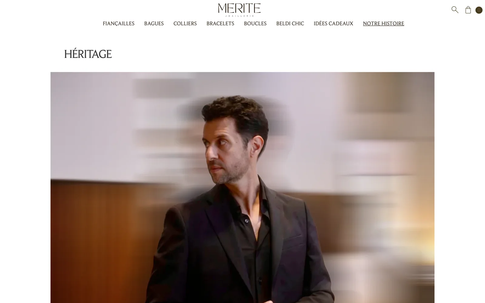 Notre Histoire page opening on a portrait under the heading Héritage.