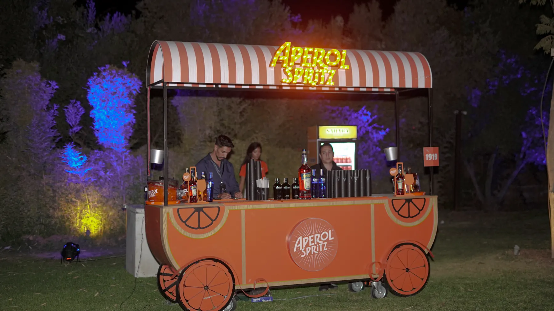The Aperol Spritz cart among the trees.