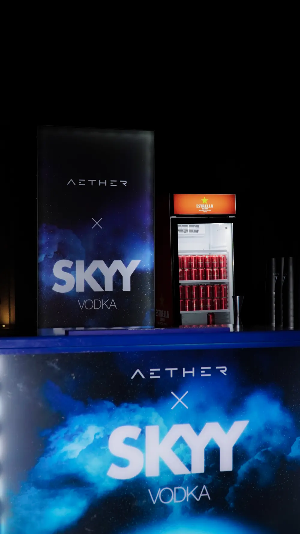 The Aether × Skyy Vodka bar, its front printed with the nebula visual.